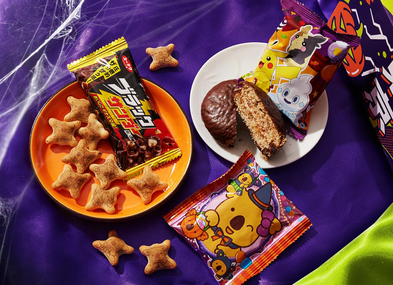 Chocolate items from the Halloween SnackHaul sit against a Halloween backdrop.