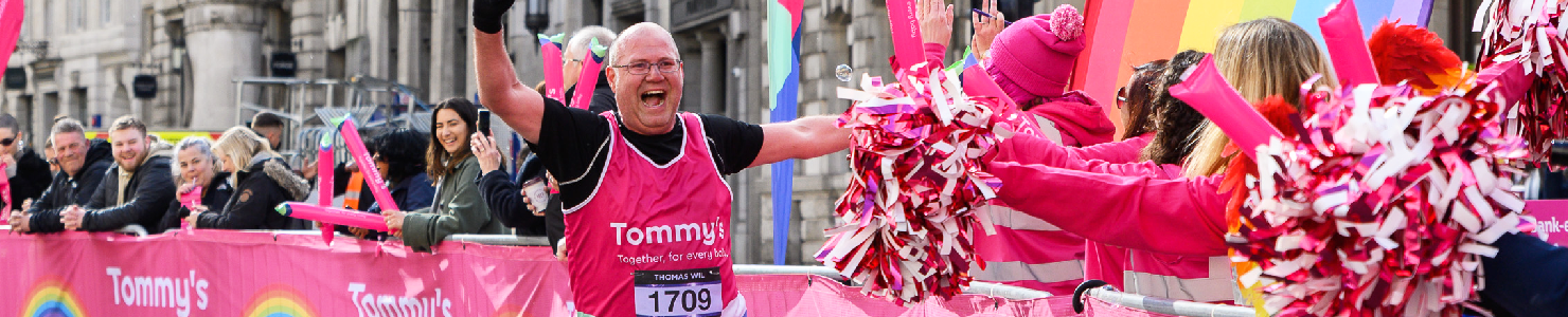Man running smiling.