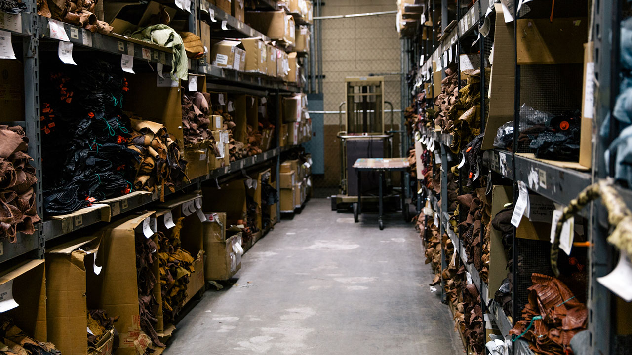 Factory aisle of Tony Lama leathers.