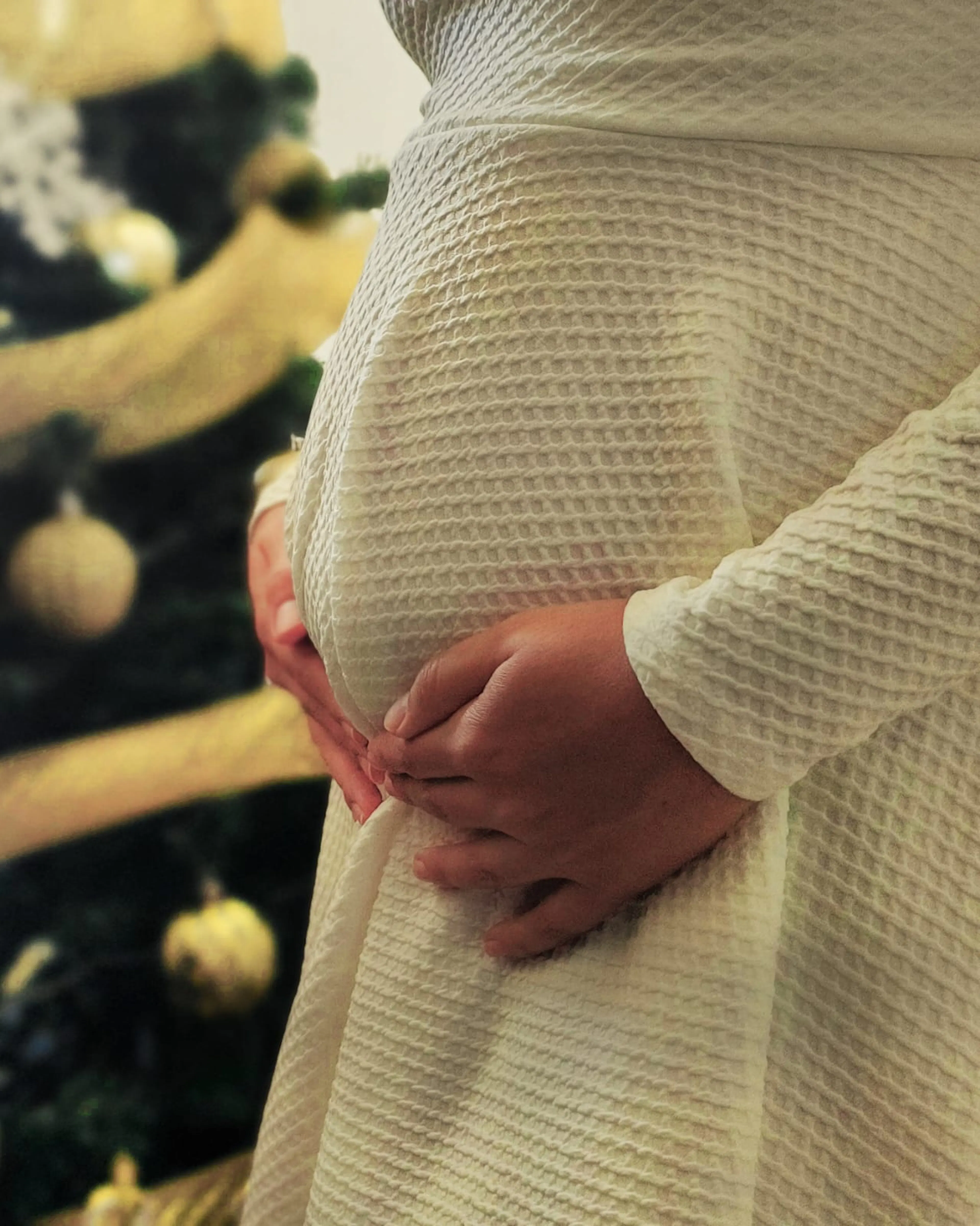 image of a baby bump on my wife