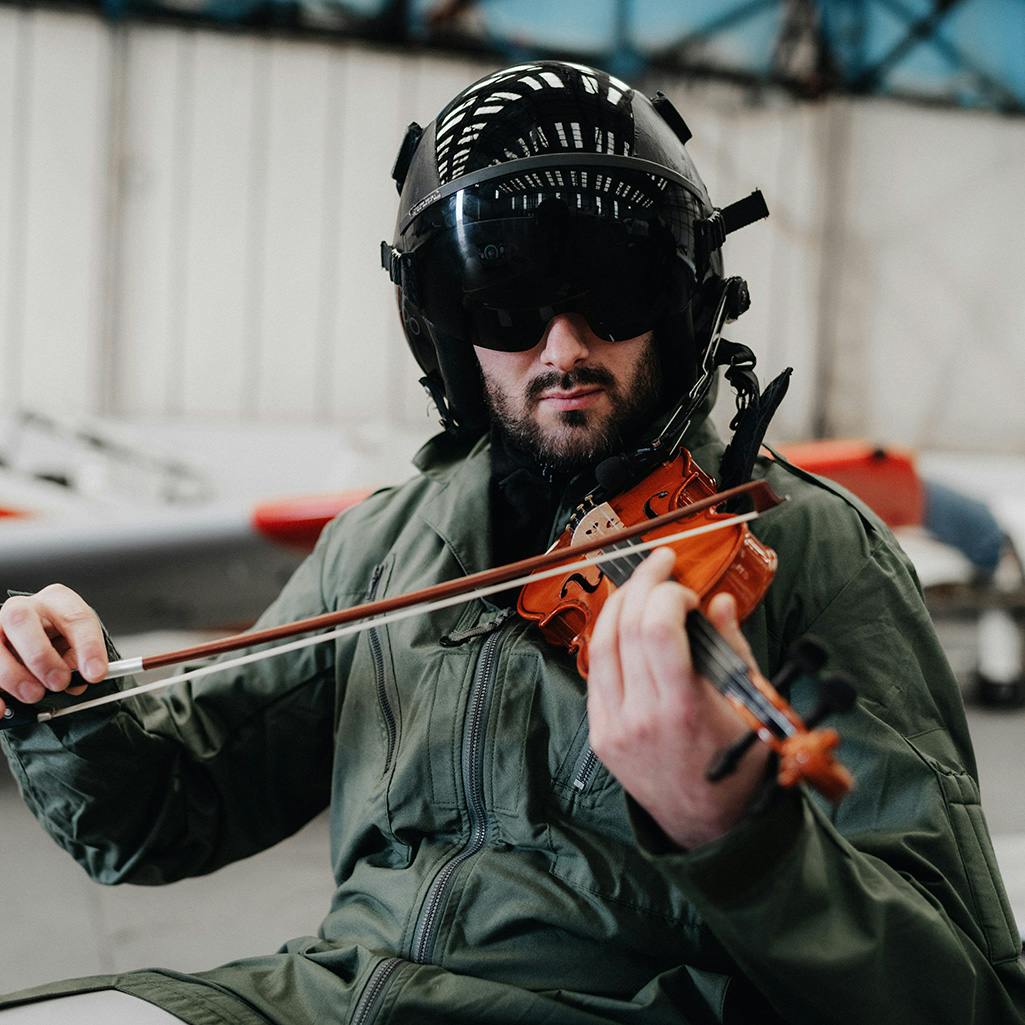 Pilot playing violin