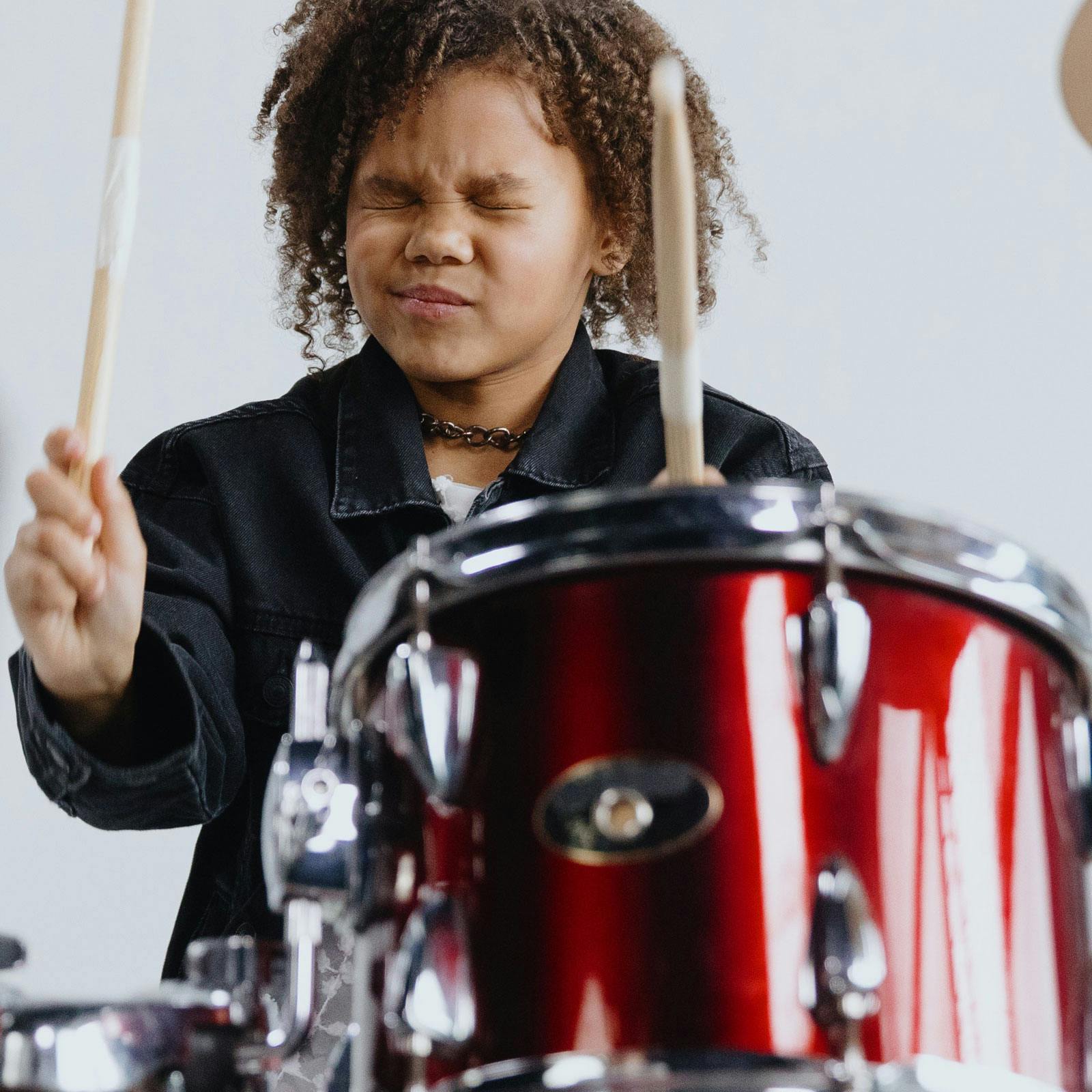 Child playing drums