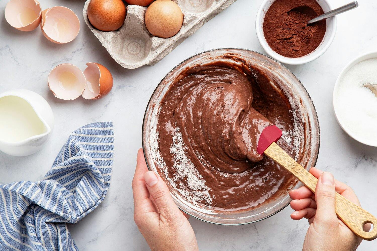 Person mixing chocolate batter