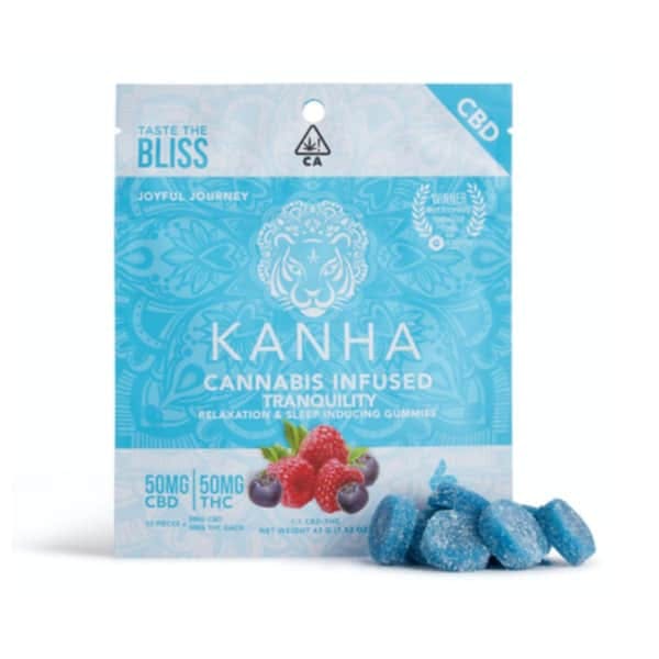 Bright blue dummies in bright blue packaging from Kanha, infused with CBD, THC, and CBN in 1:1:1 ratios to help you sleep.
