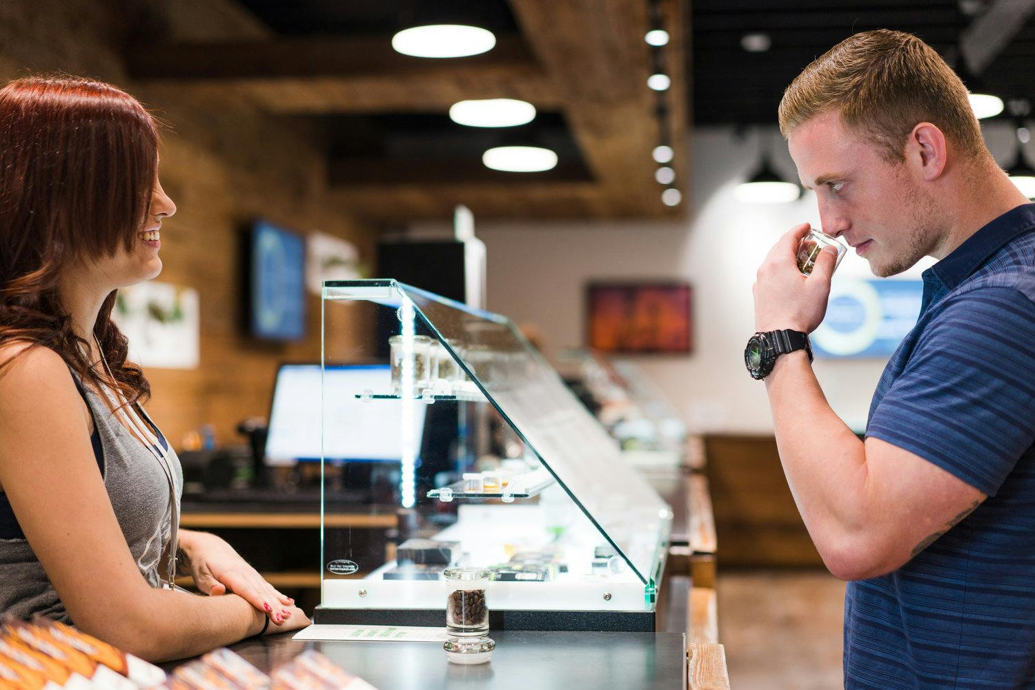 Budtender with customer 