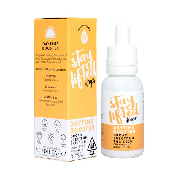A playfully designed tincture from Yummi Karmi in bright yellow packaging, encouraging you to "Stay Lifted".
