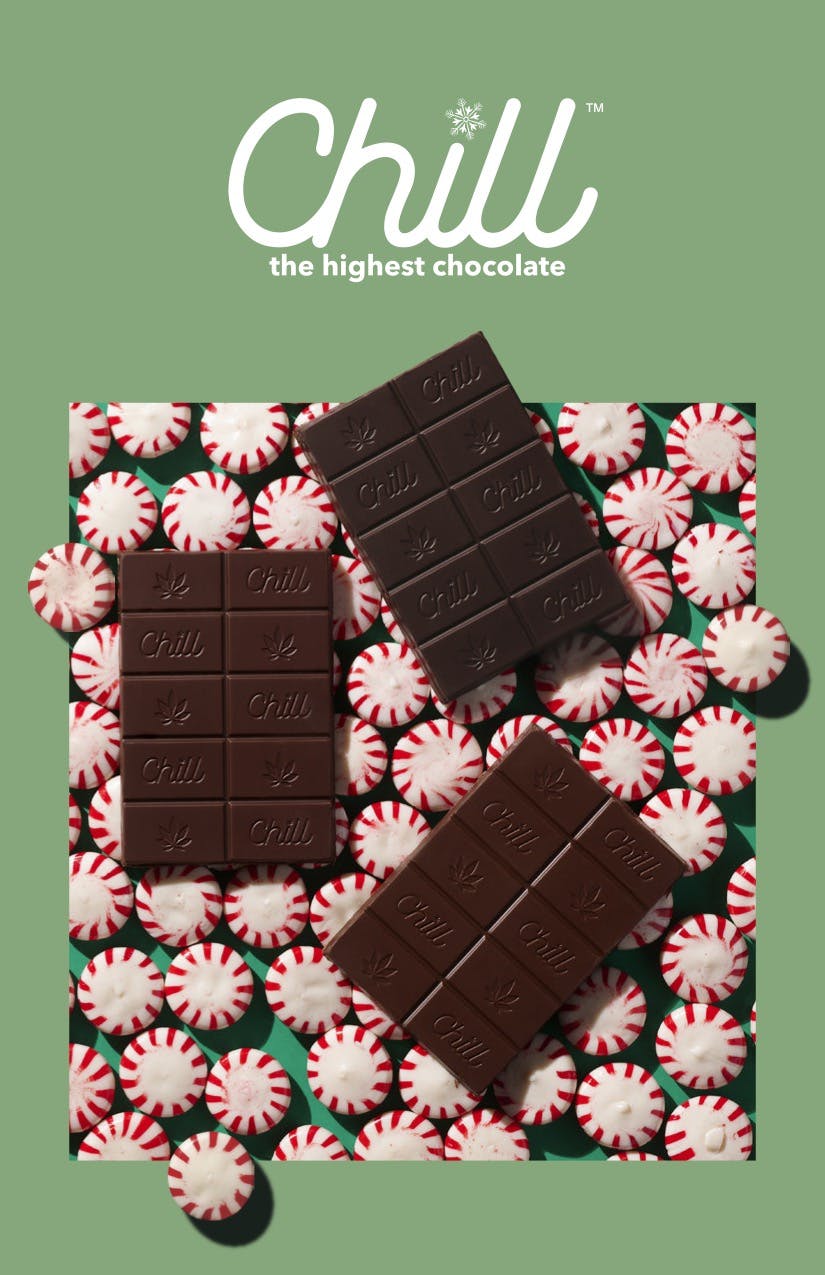 Three Chill chocolate bars on top of peppermint candies on a flyer that reads Chill on top. 