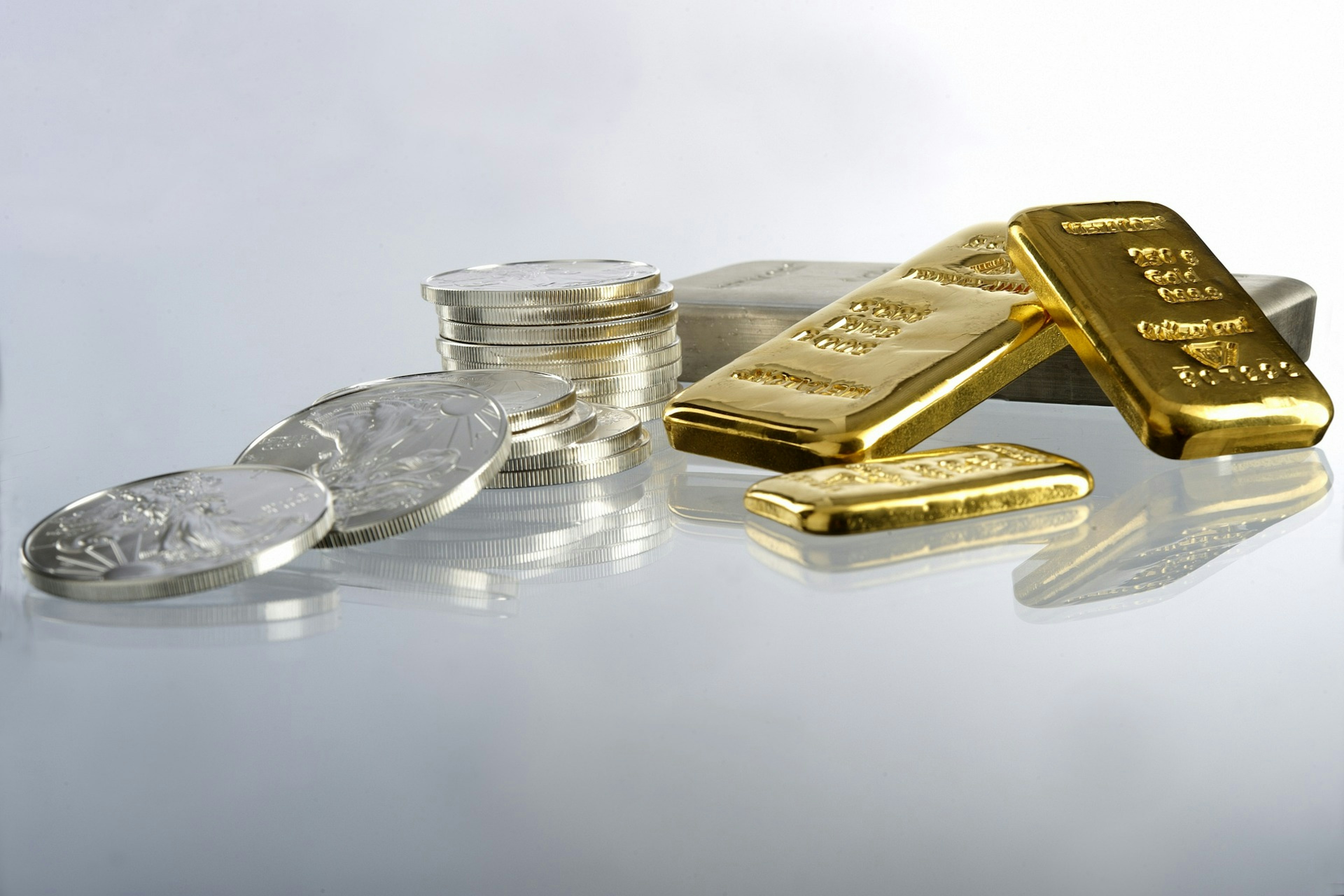 Gold and silver ETFs face November declines amid a rising dollar and higher bond yields.