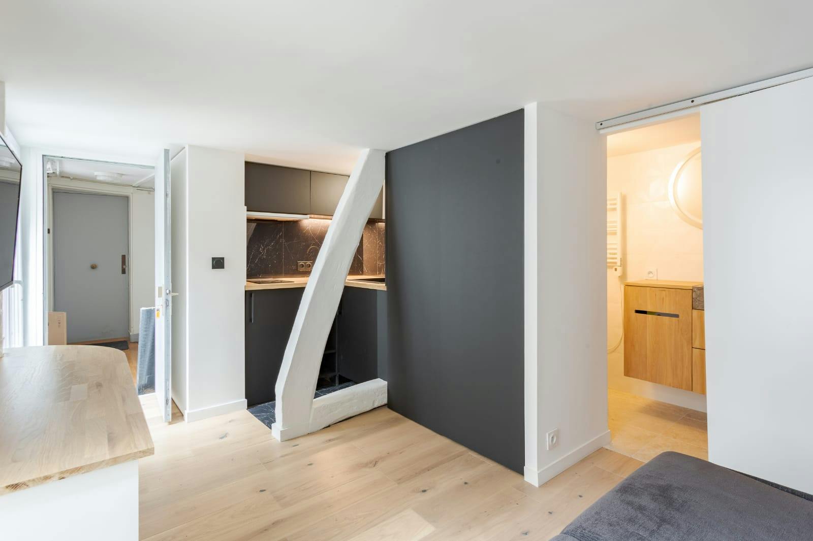 Séjour et coin cuisine studio 15 m²