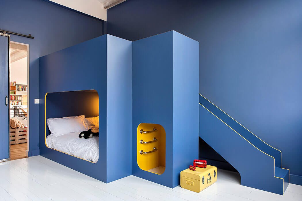 chambre d'enfant dans les tons bleus aménagée au sein du loft