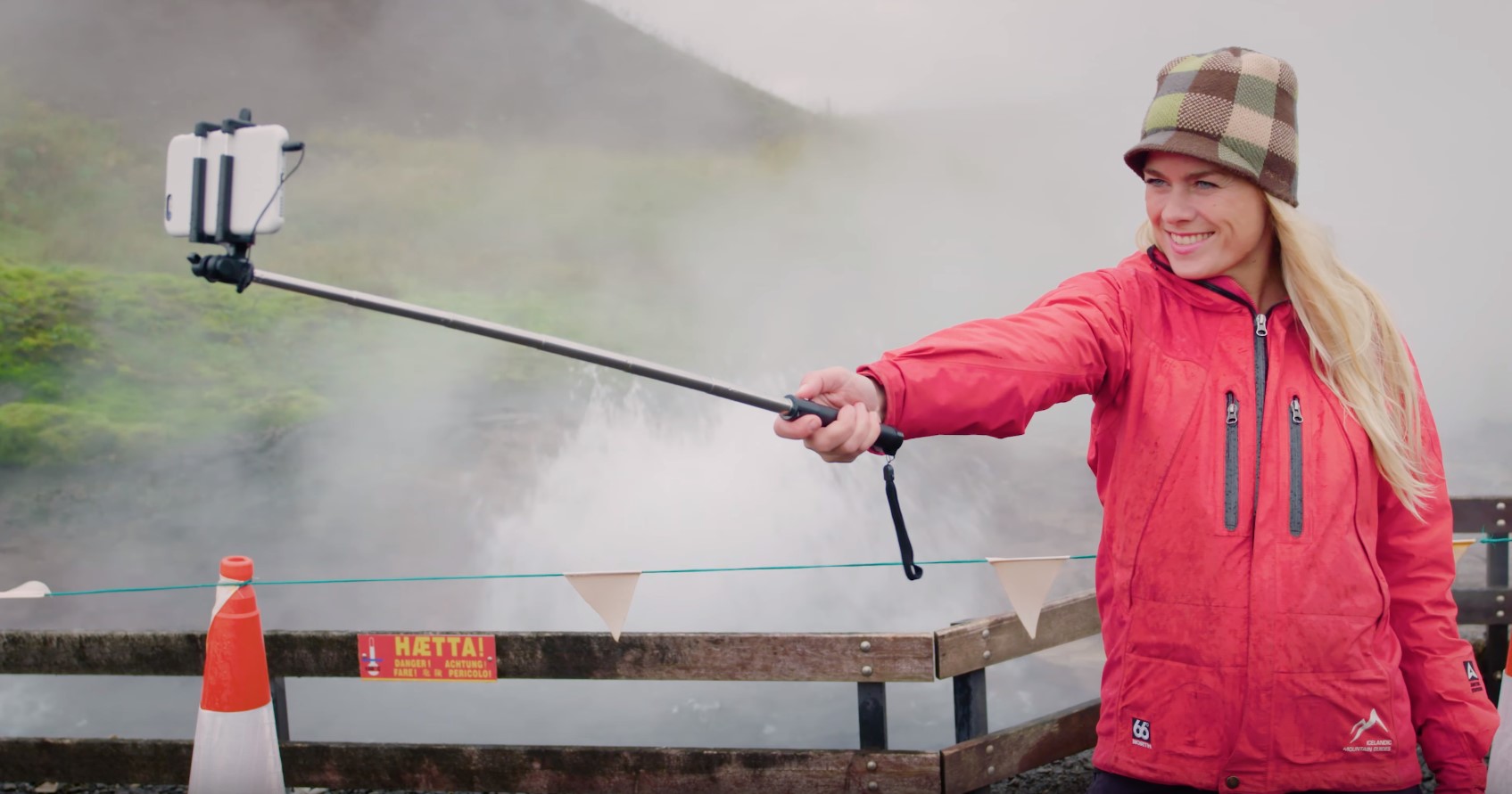 A woman taking a selfie outside