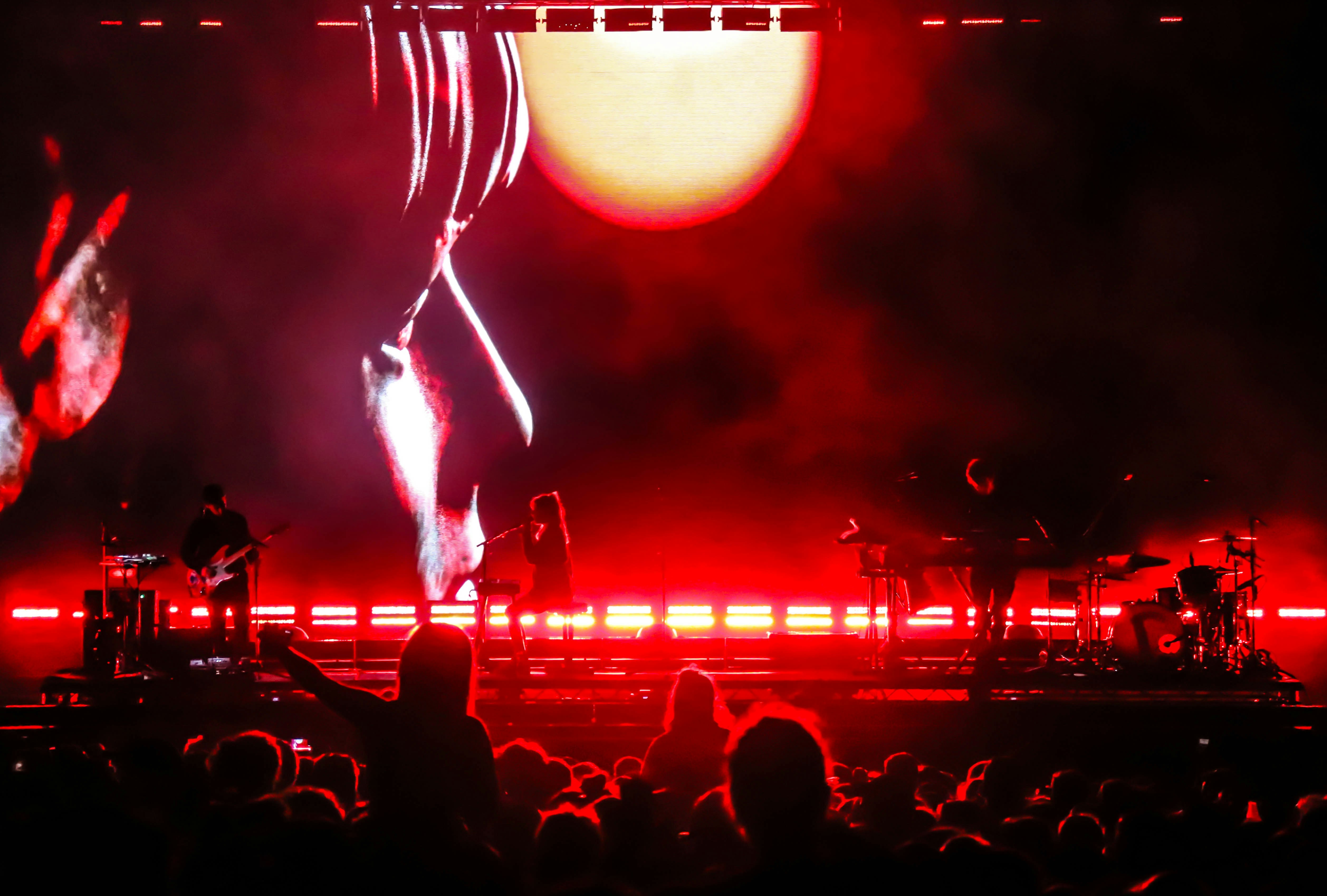 London Grammar live at Bestival 2019 Stage shot with face on-screen 2