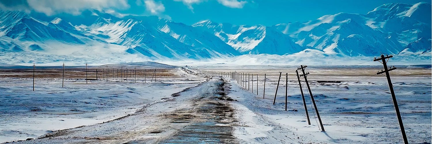 Road to snowy mountains