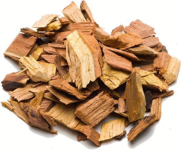 A pile of wood chips suitable as biomass fuel