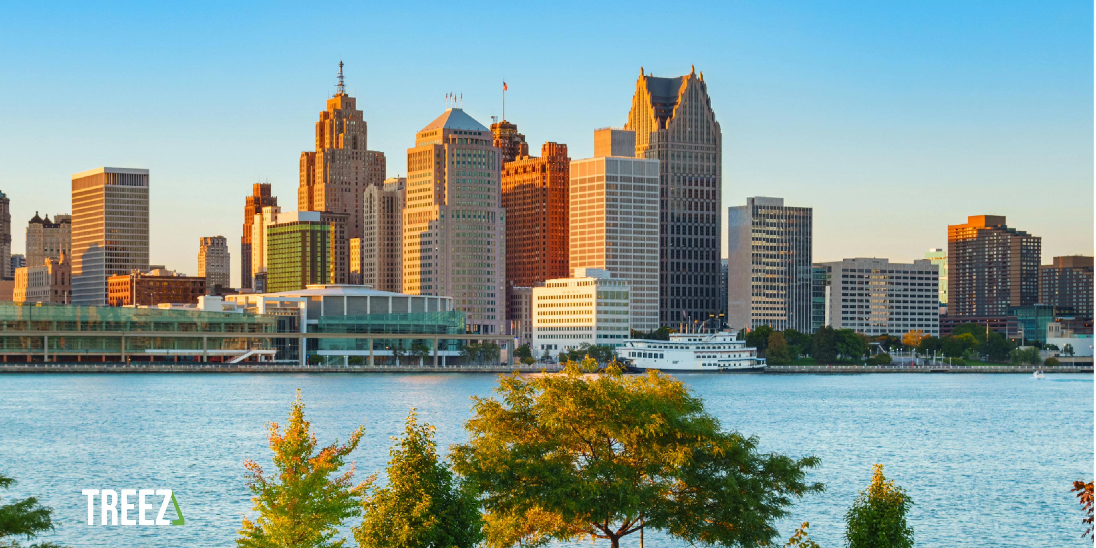 A picture of Detroit is shown with the logo of Treez, the cannabis point of sale system and cannabis payment solutions