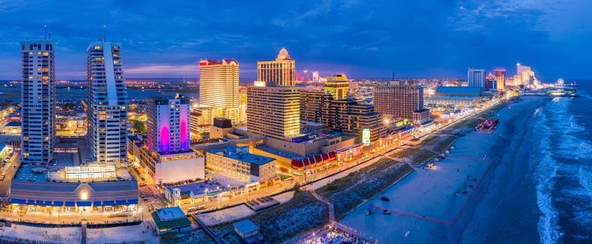 An evening skyline drone shot of Atlantic City