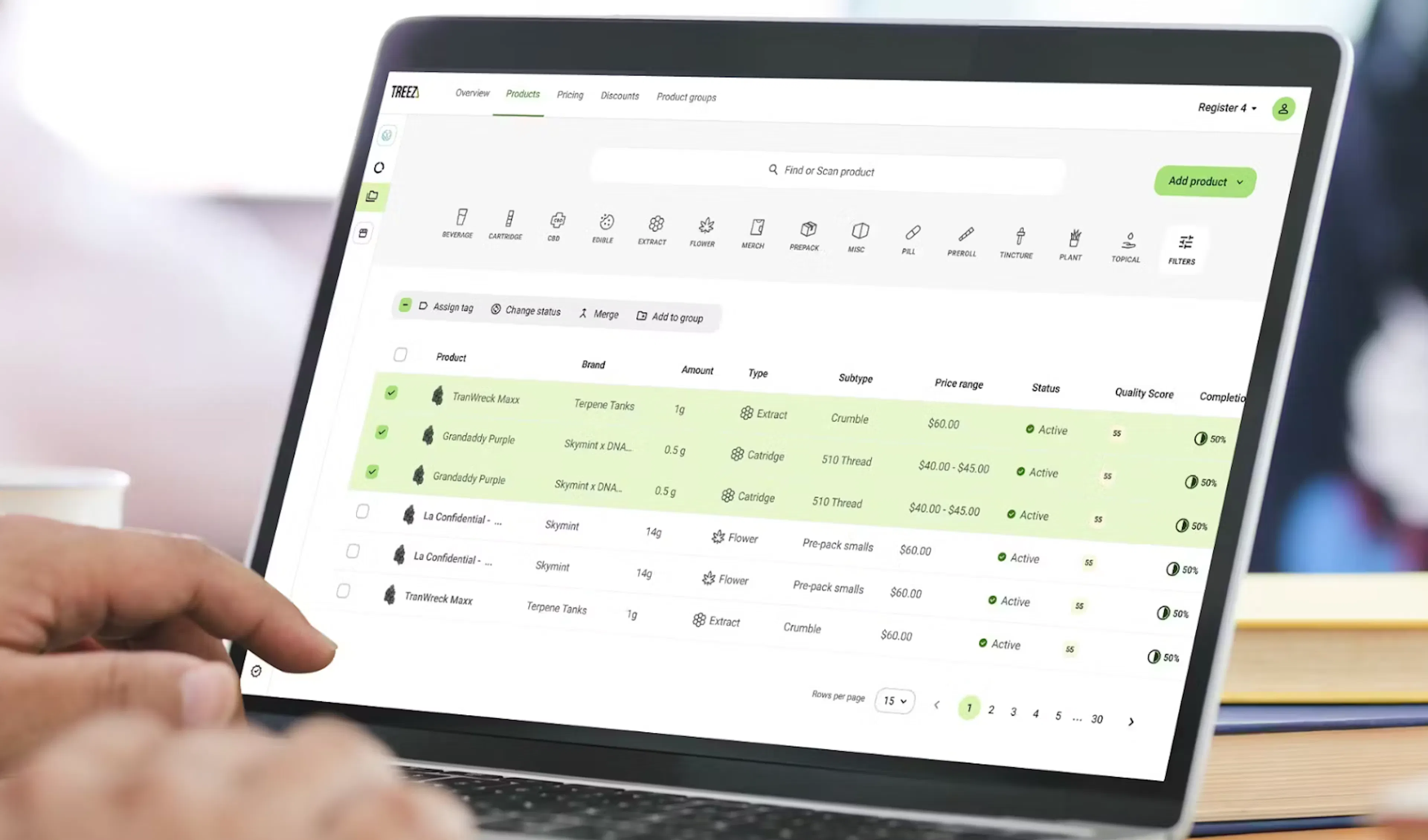 A cannabis point of sale product management screen is displayed on a manager's laptop screen. The screen asks the manager to find or scan a product and 3 products and their RFID tags are selected