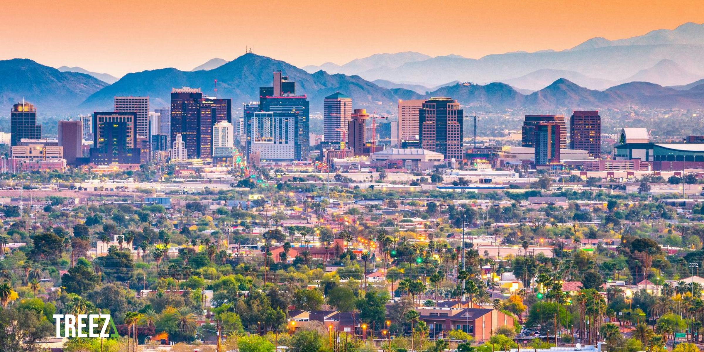 A photo of Phoenix, Arizona with mountains in the background and the city in the front ground
