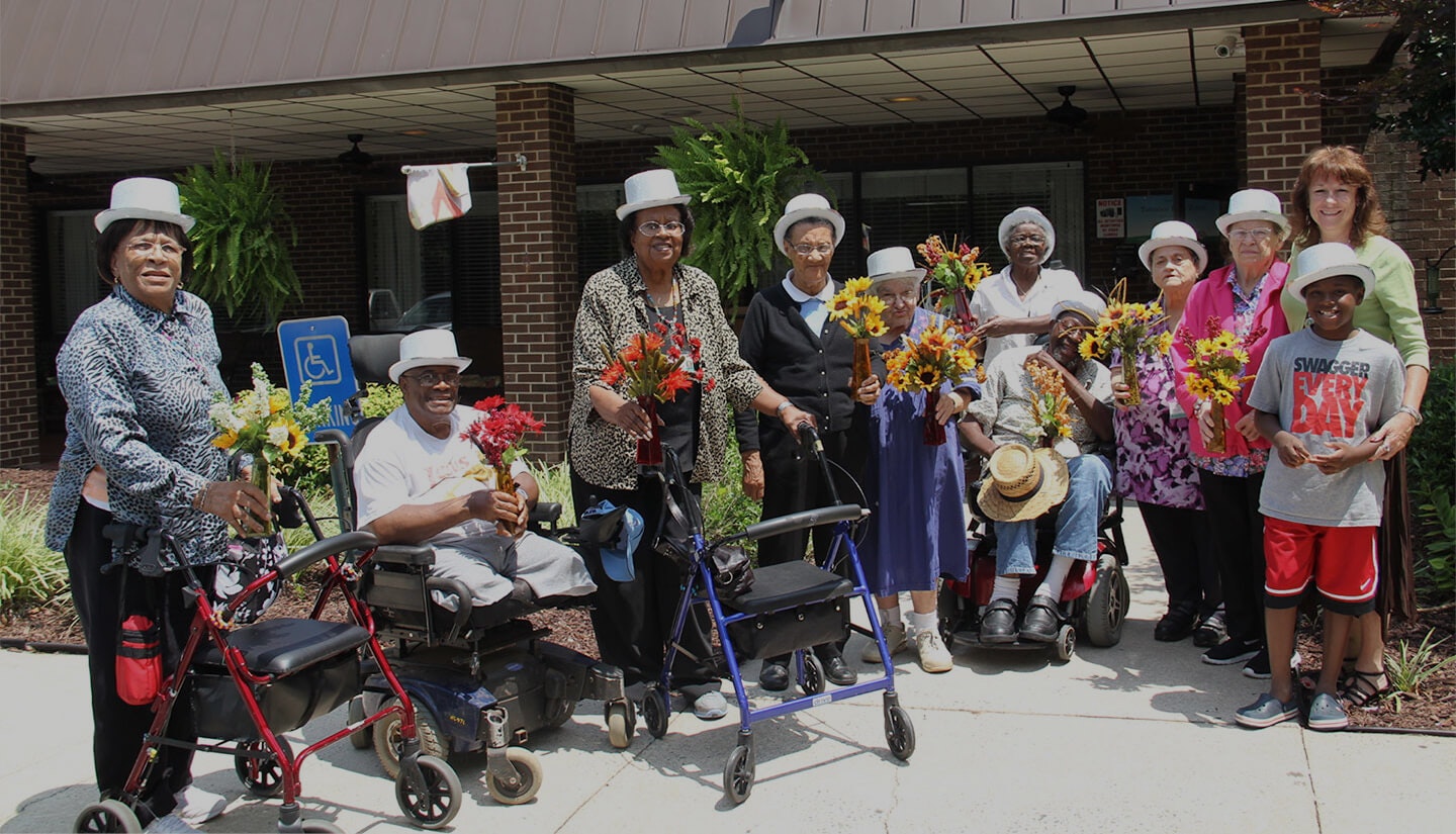 The Saints are a group of participants who use their talents to give back to the community. The group was created to empower participants to pursue volunteer opportunities that they identify and organize themselves in ways that they see fit. The goal of Silver Saints is to emphasize participants’ strengths and maximize optimal independence and support by doing intrinsically motivating and meaningful activities and goals. (Image courtesy of Piedmont Health SeniorCare.)