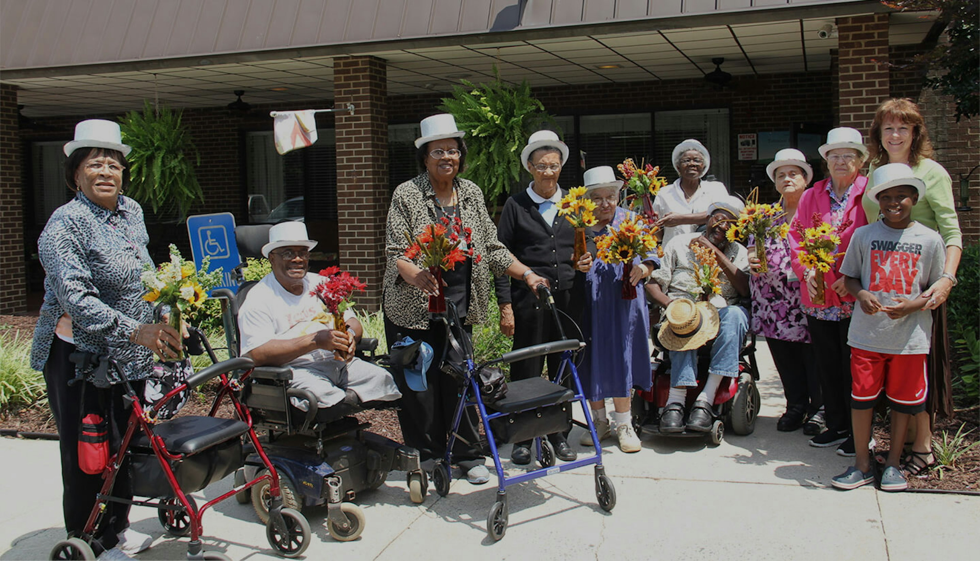 The Saints are a group of participants who use their talents to give back to the community. The group was created to empower participants to pursue volunteer opportunities that they identify and organize themselves in ways that they see fit. The goal of Silver Saints is to emphasize participants’ strengths and maximize optimal independence and support by doing intrinsically motivating and meaningful activities and goals. (Image courtesy of Piedmont Health SeniorCare.)