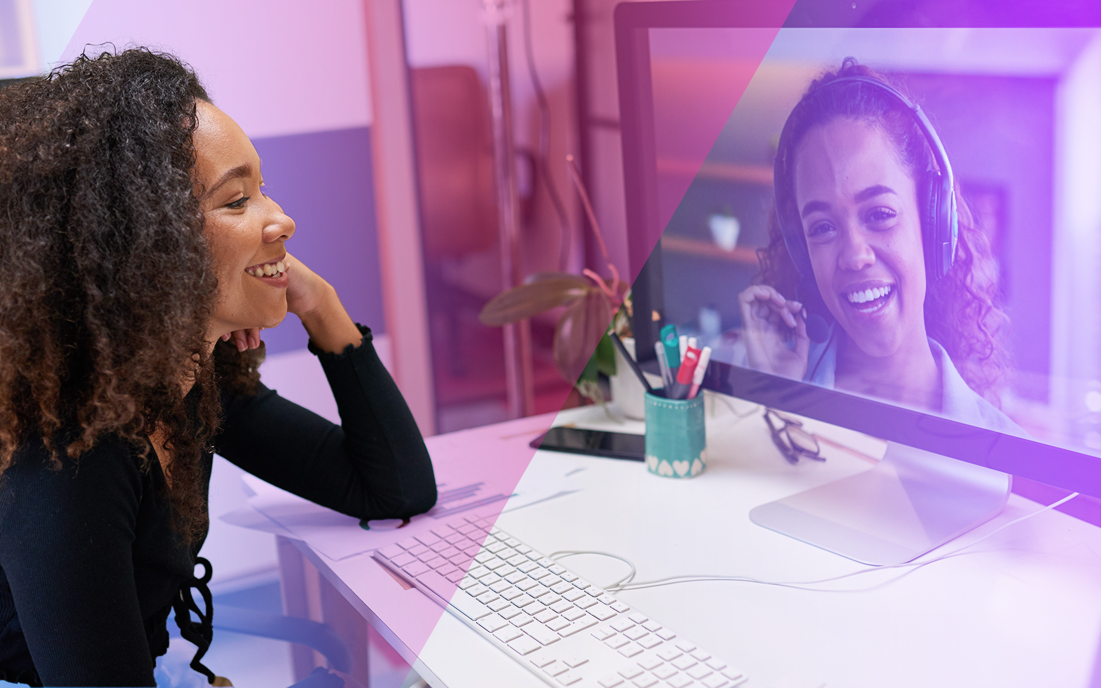 woman in an office on a video call with another woman who is working from home.