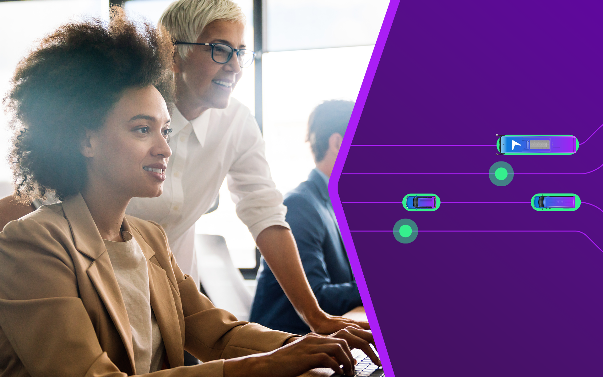 two businesswomen training at a computer