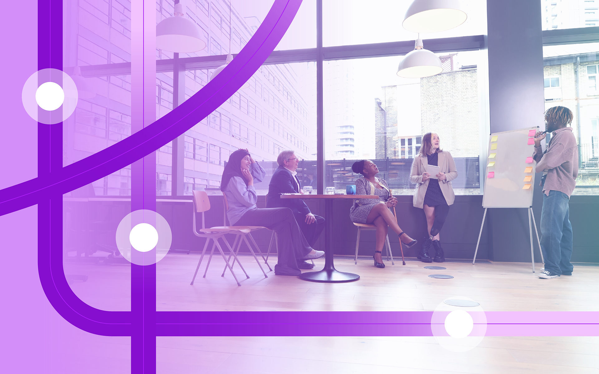 Group of business people having brainstorming session during meeting in modern office