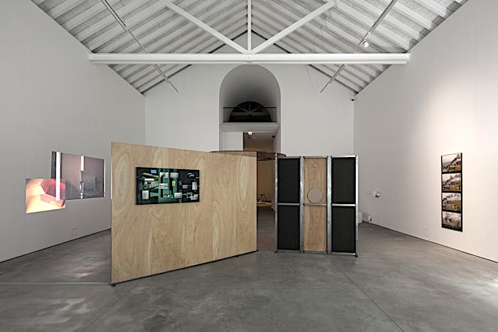 Exhibition view of Chopin, 35mm slide and 2K video installation, 2018, Perforations II (Wasteful Illuminations) photo-montage dibond print, 2018, and Smoke & Mirrors dibond print, 2018. Solo exhibition Material Longevities at Galeria Francisco Fino, Lisbon. May 2018 until July 2018