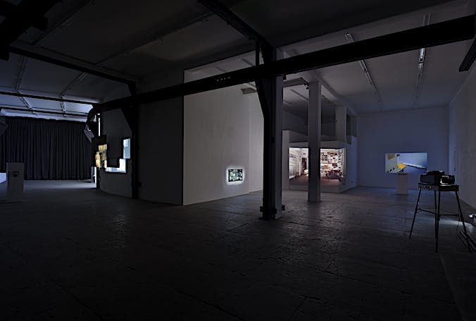 Exhibition view of film installation Postscript III-V (Berlin), 2016, Perforations (Wasteful Illuminations) dibond print, 2016, medium format slide installation Punctuation (3:54), 2016, and film installation Punctuations & Perforations, 2016. Solo exhibition Register at T293, Rome. October 2016 until December 2016