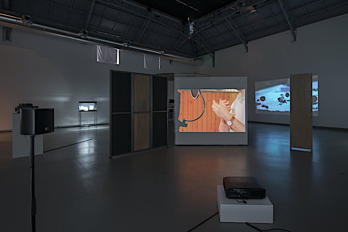 Exhibition view of film installations Smoke & Mirrors, 2017, and Registers, 2017. Solo exhibition Punctuations & Perforations at La Verrière, Brussels. April 2017 until May 2017
