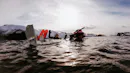 People having fun while snorkeling in cold winter time.