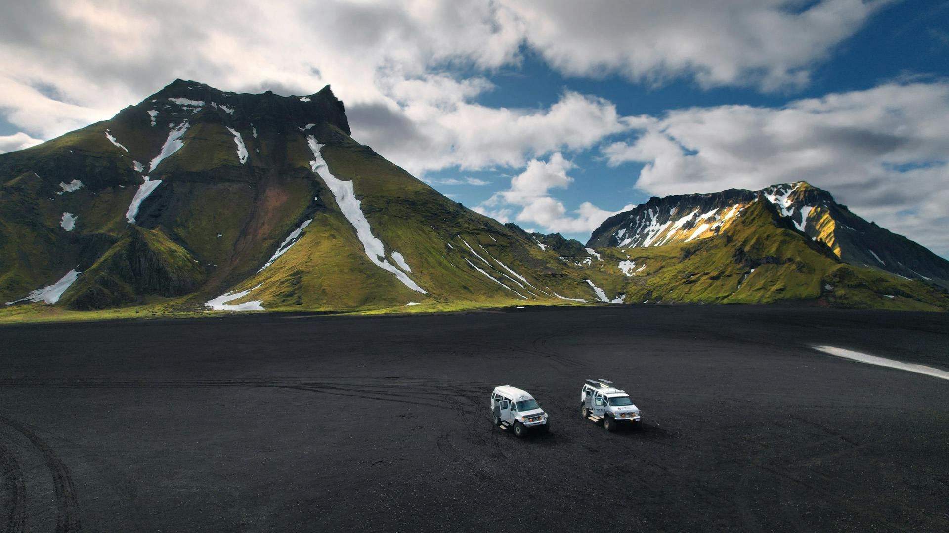 Super jeeps parked in front of where the film Star Wars Rogue 1 was filmed.