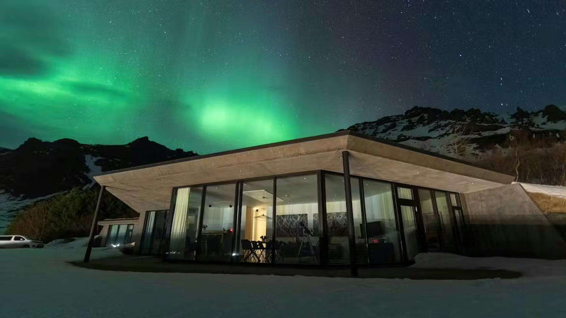 Villa with Northern Lights above the house