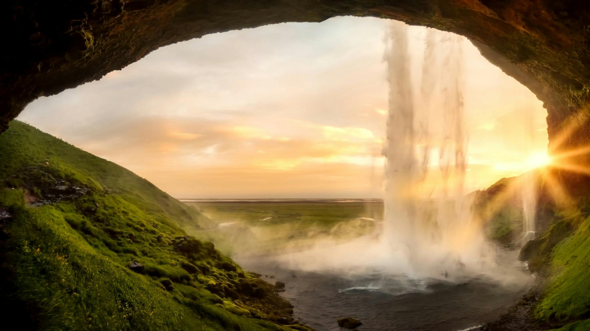 A waterfall photograph during a sunset.