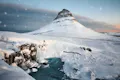 Kirkjufell cove3red with snow in Iceland