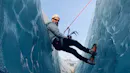 Man having a break after ice climbing.
