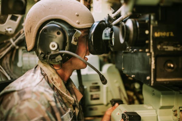 Soldier with headset on duty