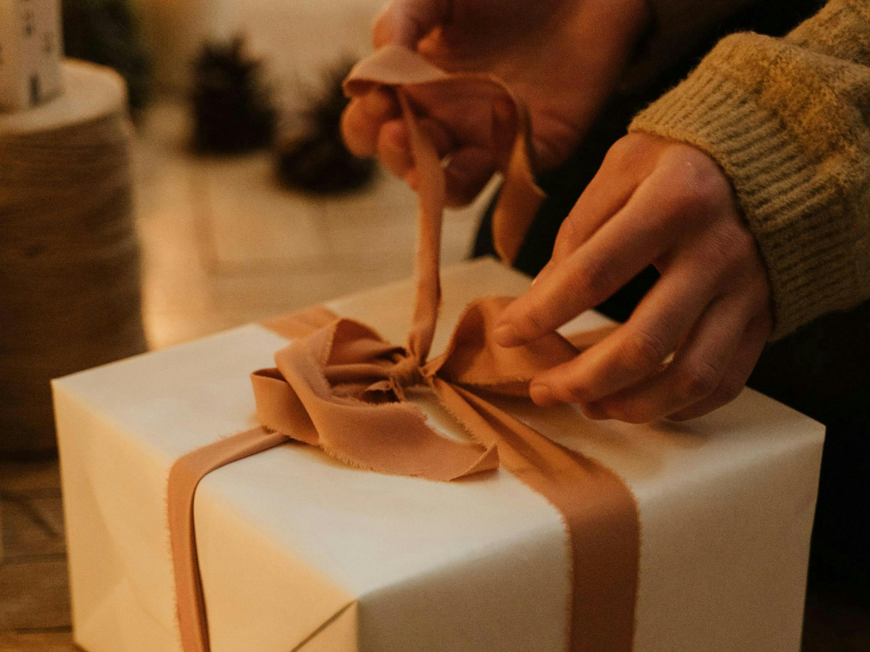 military spouse wrapping a present