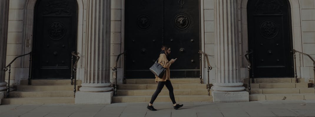 Person in front of bank