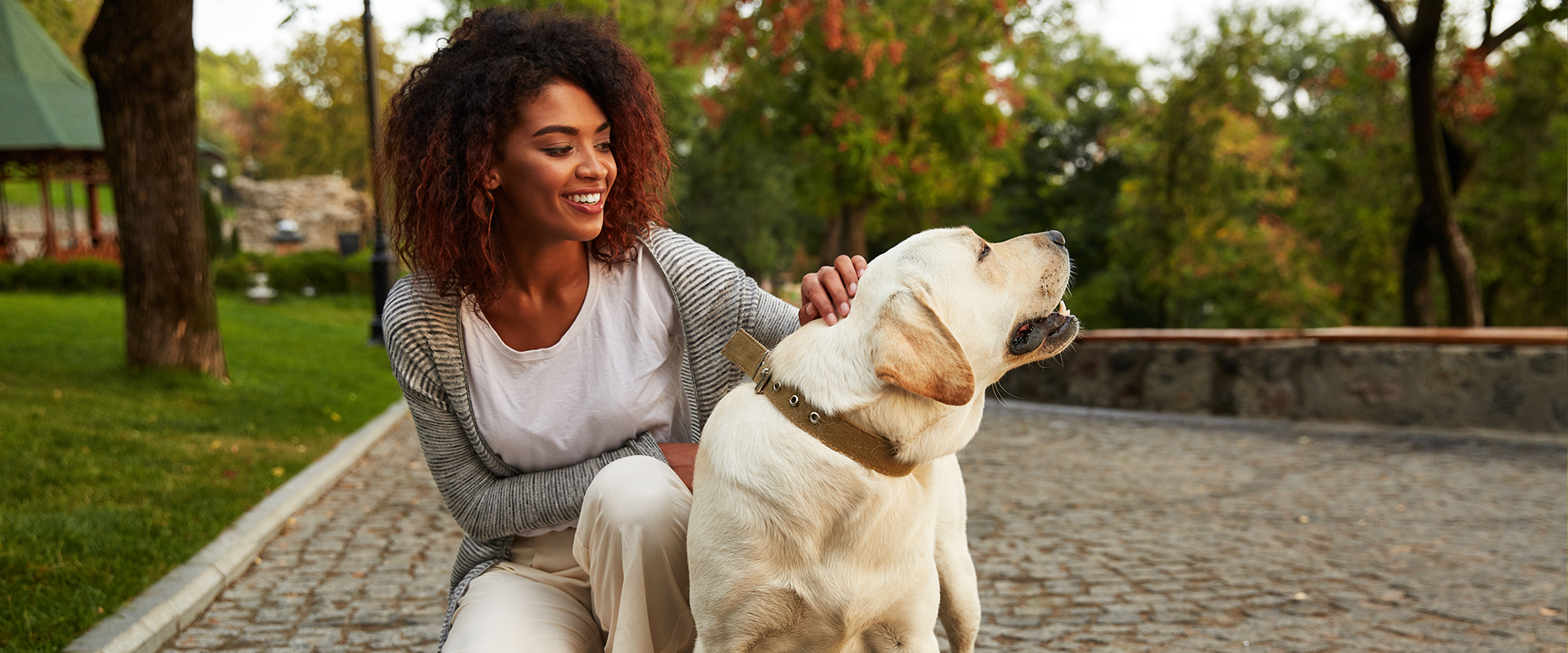 A woman and her dog in a Denver dog park