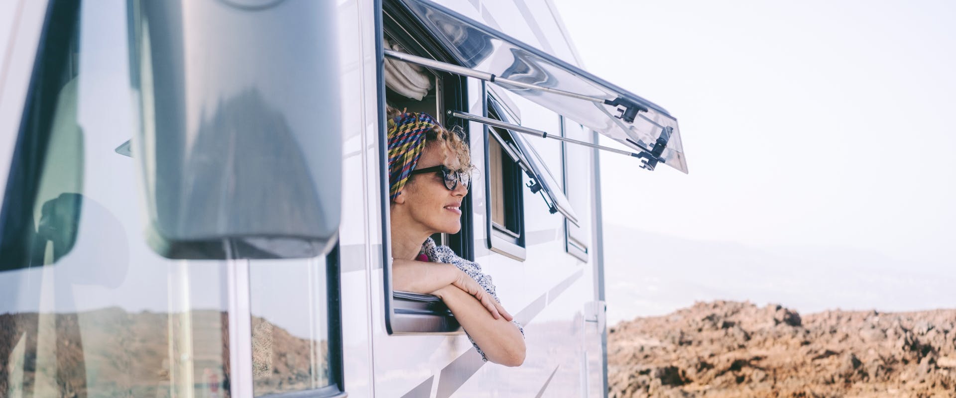 solo female traveler on a solo camping trip in an RV