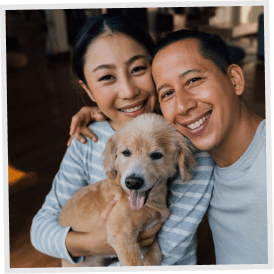 A couple with a puppy