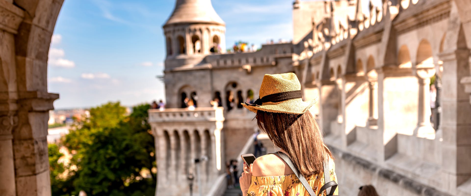 a solo female traveler at the fisherman's bastion in budapest