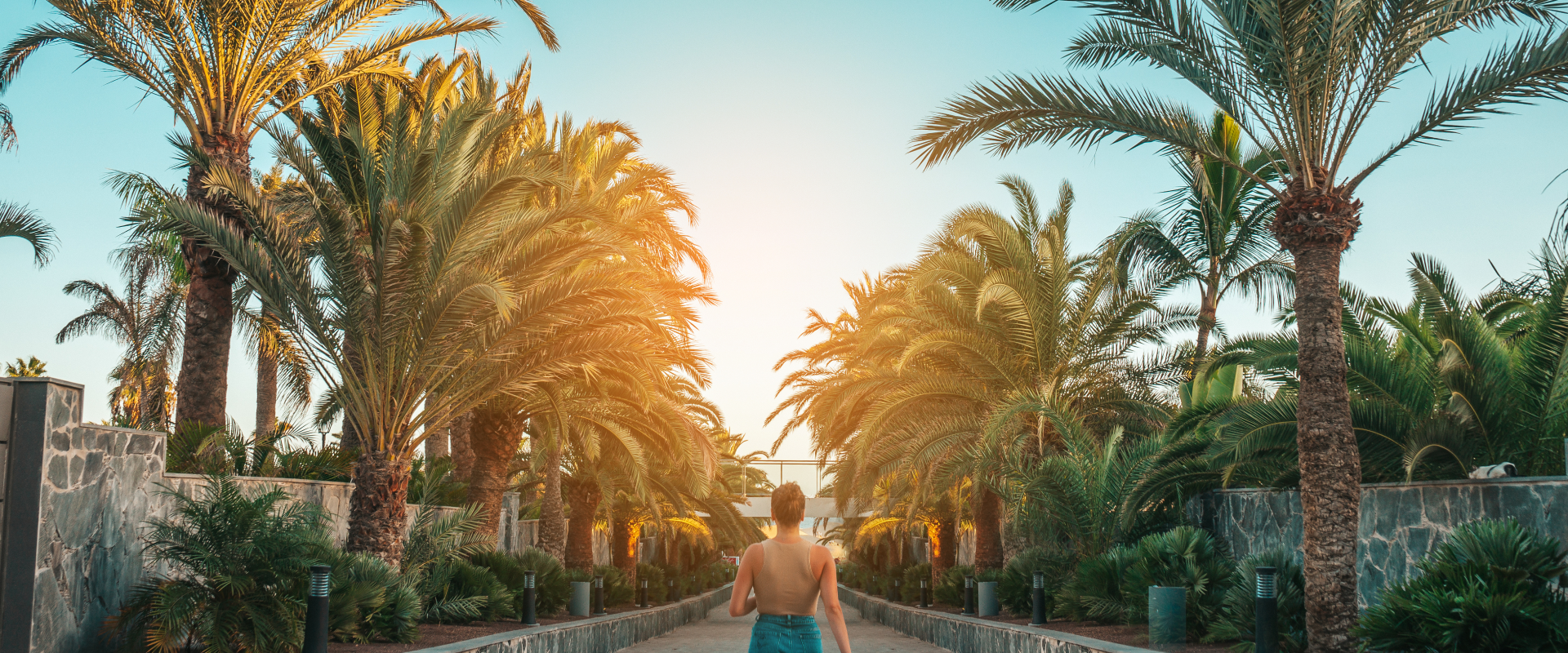 a solo female traveler walking through downtown Miami walkway