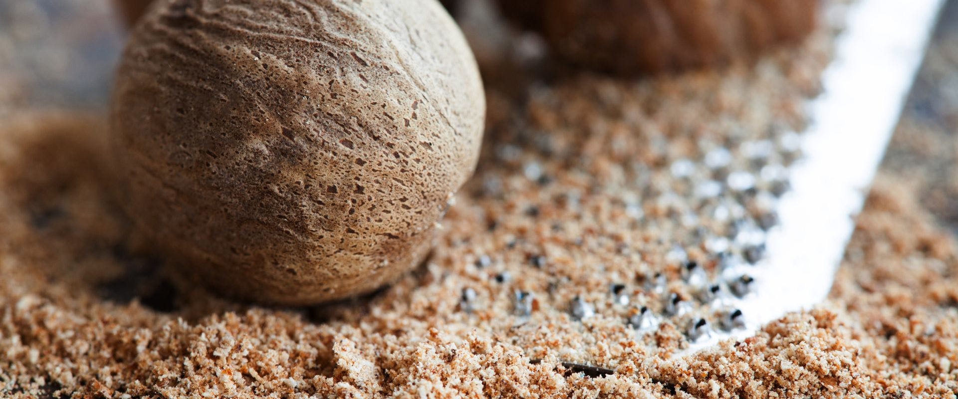Close-up of nutmeg being grated