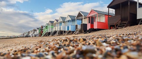 Colourful beach huts on the beach in Southend