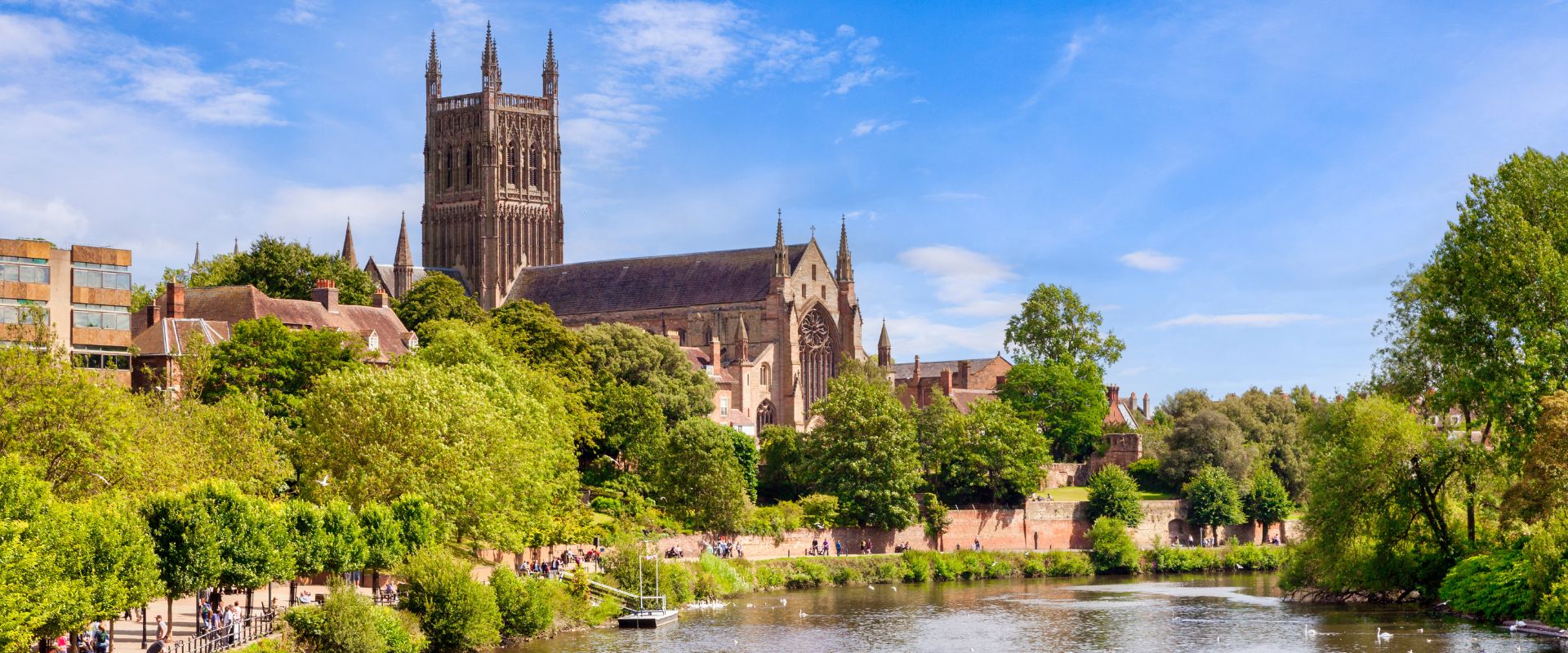 Dog-friendly Worcester Cathedral and the River Severn on a bright sunny summer day