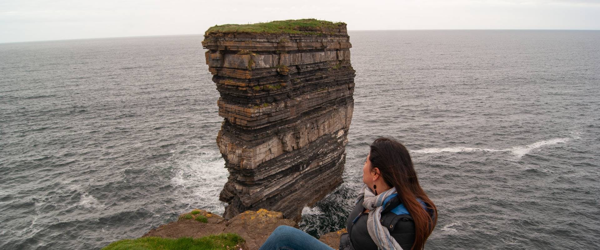 solo female traveler in ireland at the cliffs of moher