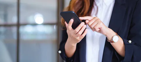 Woman scrolling on her mobile phone