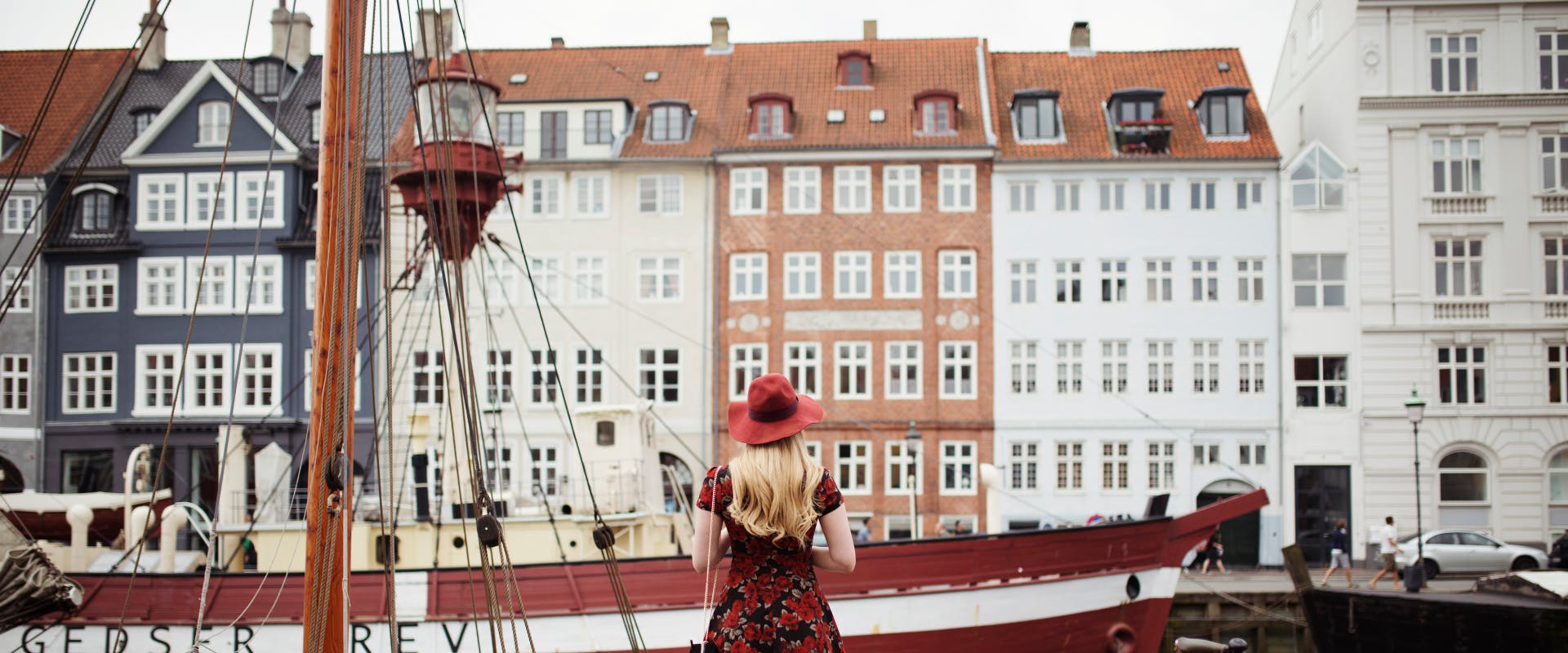 a solo female traveler looking a room of Copenhagen houses by the docks